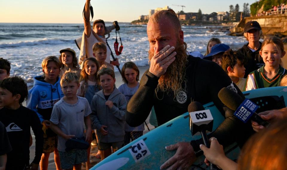 Blake Johnston speaks to the media after breaking the record (AFP via Getty Images)