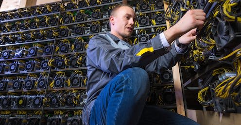 <span class="caption">Proof of work mining requires specialist hardware, and as a result is energy intensive.</span> <span class="attribution"><a class="link " href="https://www.shutterstock.com/image-photo/miner-bitcoin-cryptocurrency-763347796" rel="nofollow noopener" target="_blank" data-ylk="slk:Mark Agnor/Shutterstock;elm:context_link;itc:0;sec:content-canvas">Mark Agnor/Shutterstock</a></span>