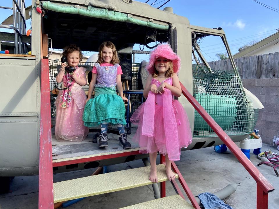 Louise and Dan’s daughters, Dani, Ashley and Rachel playing princesses in their helicopter (Collect/PA Real Life)