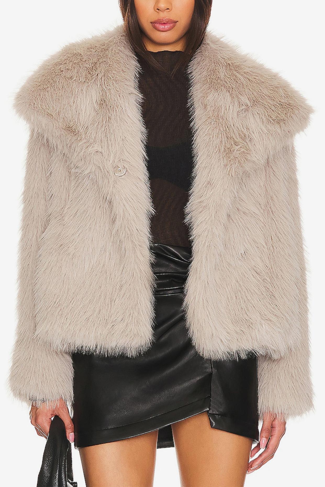 <p><a href="https://go.redirectingat.com?id=74968X1596630&url=https%3A%2F%2Fwww.revolve.com%2Fastr-the-label-lynx-faux-fur-coat-in-silver%2Fdp%2FASTR-WO85%2F&sref=https%3A%2F%2Fwww.elle.com%2Ffashion%2Fshopping%2Fg46907891%2Fbest-faux-fur-coats-women%2F" rel="nofollow noopener" target="_blank" data-ylk="slk:Shop Now;elm:context_link;itc:0;sec:content-canvas" class="link rapid-noclick-resp">Shop Now</a></p><p>Lynx Faux Fur Coat</p><p>Revolve</p><p>$198.00</p>