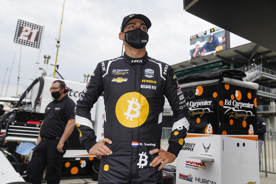 Rinus VeeKay of the Netherlands waits for his team to bring his car out to the pit area during practice for the Indianapolis 500 auto race at Indianapolis Motor Speedway in Indianapolis, Tuesday, May 18, 2021. (AP Photo/Michael Conroy)