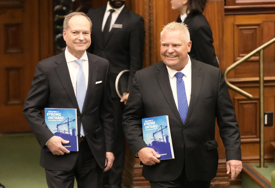 Ontario Finance Minister Peter Bethlenfalvy (left) and Premier Doug Ford arrive to table the provincial budget at the legislature at Queen's Park in Toronto on Thursday, March 23, 2023. THE CANADIAN PRESS/Frank Gunn