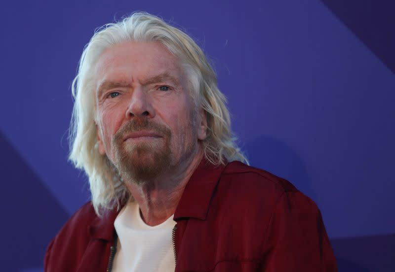 Sir Richard Branson listens to a question at the unveiling of the Virgin Voyages ship in New York