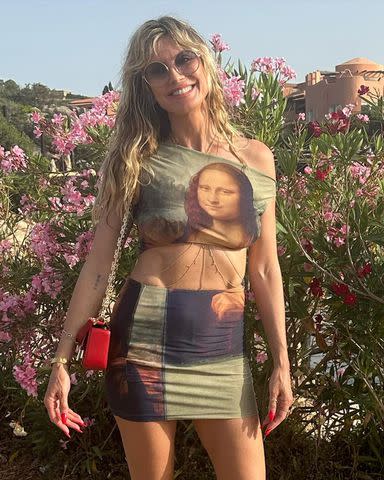 <p>heidiklum/Instagram</p> Heidi Klum shows off her outfit during European vacation in July 2023.