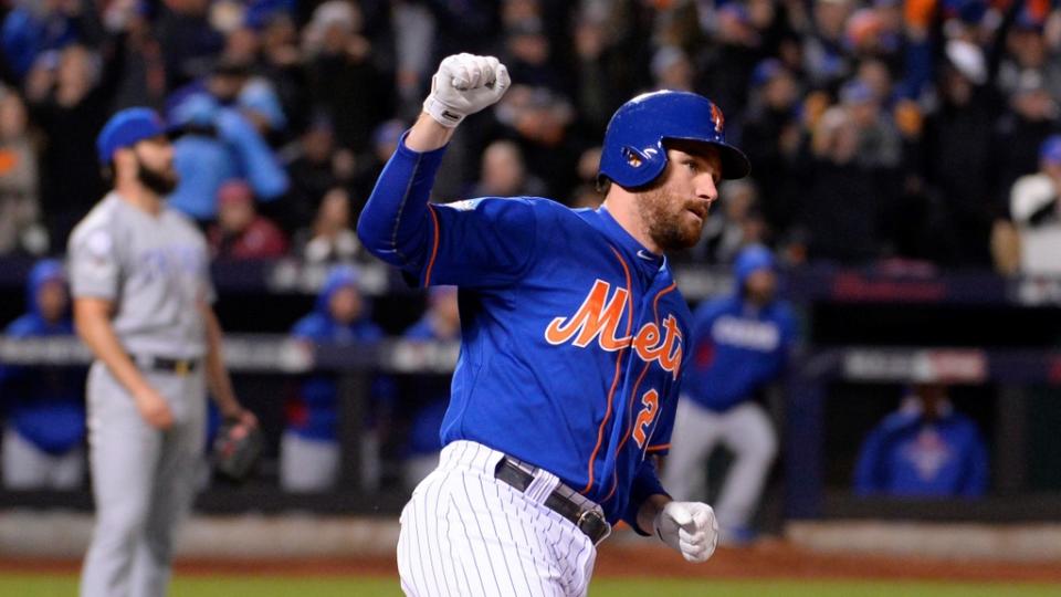 Oct 18, 2015; New York City, NY, USA; New York Mets second baseman Daniel Murphy (28) reacts after hitting a two-run home run against Chicago Cubs starting pitcher Jake Arrieta (background) in the first inning in game two of the NLCS at Citi Field. Mandatory Credit: Robert Deutsch-USA TODAY Sports