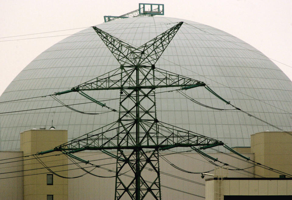 FILE - The nuclear power plant is seen in Brokdorf, northern Germany, Nov. 22, 2006. TGermany on Friday, Dec. 31, 2021 is shutting down half of the six nuclear plants it still has in operation, a year before the country draws the final curtain on its decades-long use of atomic power. (AP Photo/Heribert Proepper, file)