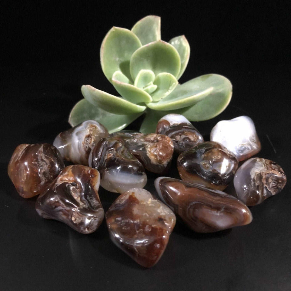 <p><a href="https://crystalvisions.net.au/products/fire-agate-tumble-stones?_pos=1&_sid=bfde8aac1&_ss=r" rel="nofollow noopener" target="_blank" data-ylk="slk:Shop Now;elm:context_link;itc:0;sec:content-canvas" class="link ">Shop Now</a></p><p>Fire Agate Tumble Stones</p><p>crystalvisions.net.au</p><p>$9.00</p>