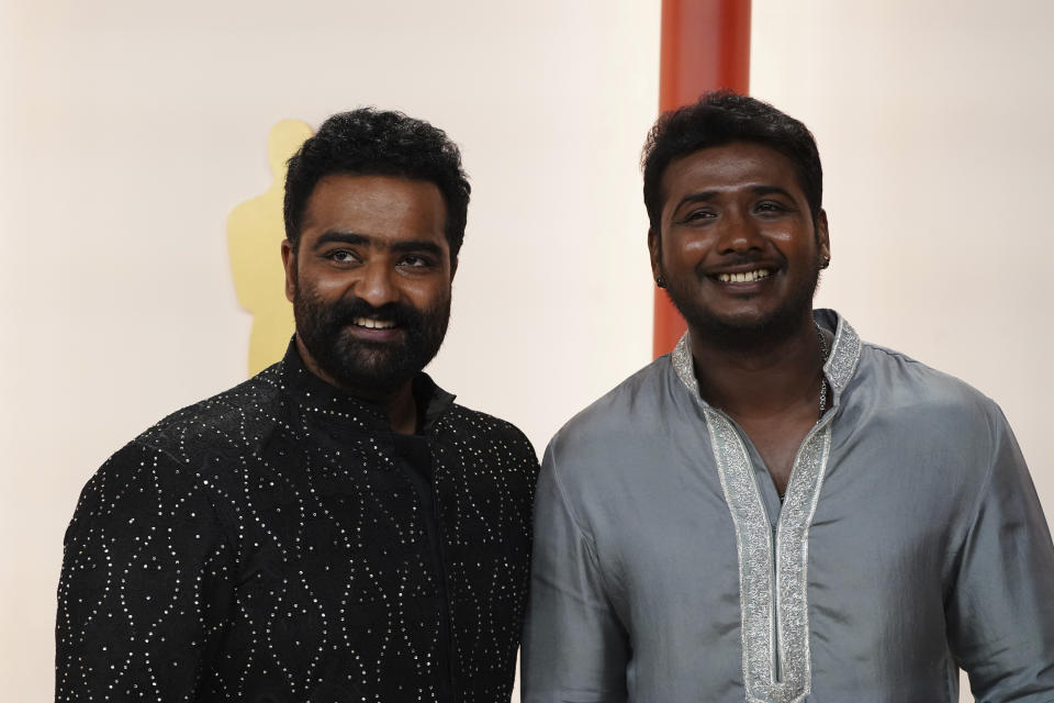 Kaala Bhairava, left, and Rahul Sipligunj arrive at the Oscars on Sunday, March 12, 2023, at the Dolby Theatre in Los Angeles. (Photo by Jordan Strauss/Invision/AP)