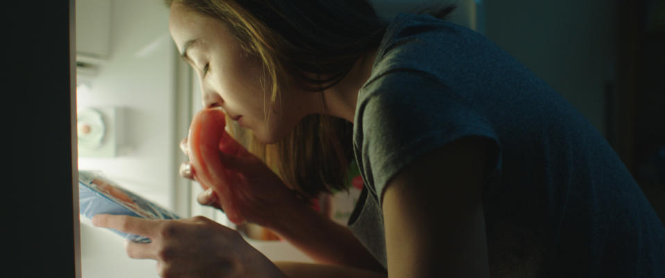 Garance Marillier smelling meat.