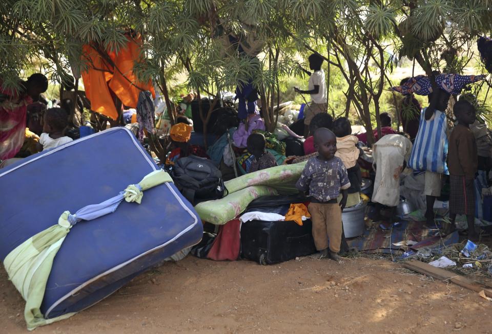 Internally displaced people sit inside UNMIS compound n Juba