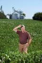 Farmer Doug Zink stands in one of his soybean fields near Carrington, North Carolina