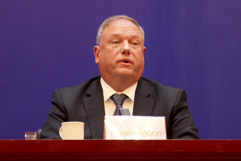 Austin Moore, an attache to China for the U.S. Homeland Security Department, speaks during a press conference on cracking down on fentanyl trafficking in Xingtai in northern China's Hebei province Thursday, Nov. 7, 2019. A Chinese court sentenced nine fentanyl traffickers Thursday in a case that was a culmination of a rare collaboration between Chinese and U.S. law enforcement to crack down on global networks that manufacture and distribute lethal synthetic opioids. (AP Photo/Erika Kinetz)