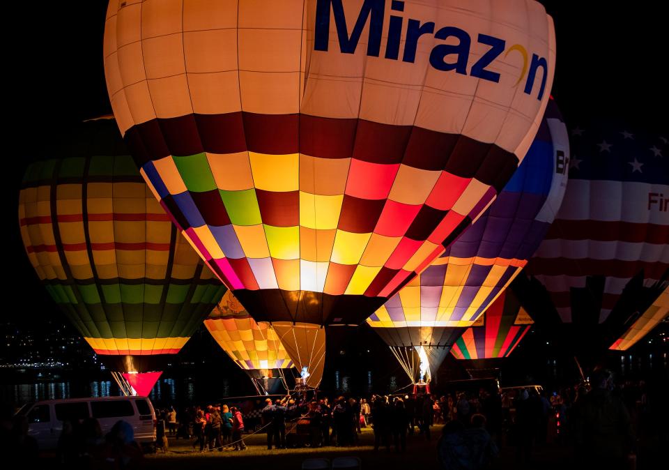 Colorful balloons lit up the sky at Waterfront Park during the KDF Great Balloon Glow on Friday night. April 28, 2023