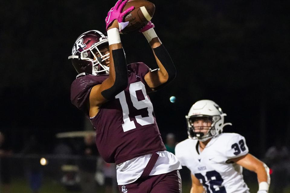 Braden River's AJ Causey makes the catch during Friday night's game against Parrish Community.