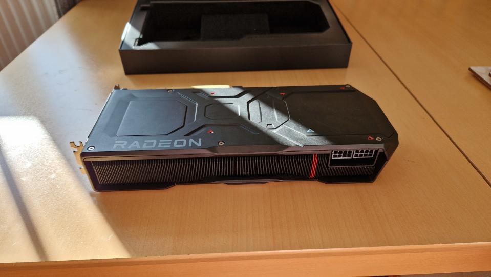 AMD Radeon RX 7900 XTX lying on a table from above