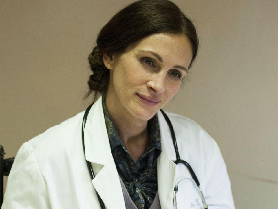 Dr. Emma Brookner smiles at someone offscreen in this still from HBO's "The Normal Heart."