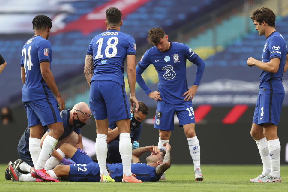 Chelsea's Christian Pulisic is injured during the FA Cup final soccer match between Arsenal and Chelsea at Wembley stadium in London, England, Saturday, Aug.1, 2020. (Catherine Ivill/Pool via AP)