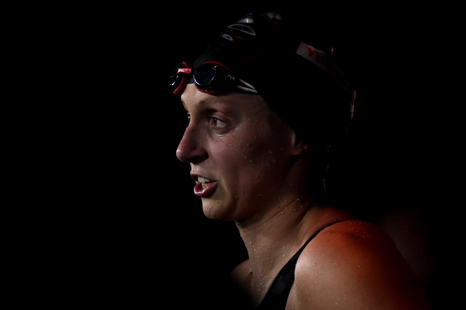 Katie Ledecky of the United States talks with journalist after winning the women's 800m final at the 19th FINA World Championships in Budapest, Hungary, Friday, June 24, 2022. (AP Photo/Petr David Josek)
