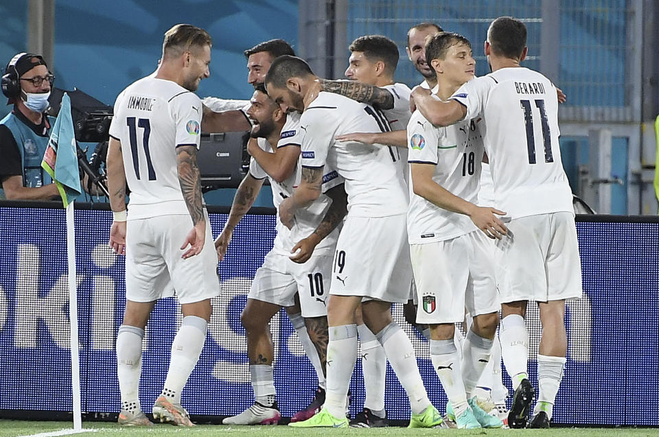 Italian players celebrate scoring their side's third goal during the Euro 2020 soccer championship group A match between Turkey and Italy at the Olympic stadium in Rome, Friday, June 11, 2021. (Ettore Ferrari/Pool via AP)