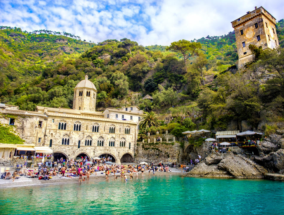 The San Fruttuoso Abbey stands over a small beach between Portofino and Camogli, reachable only by sea or hiking. 