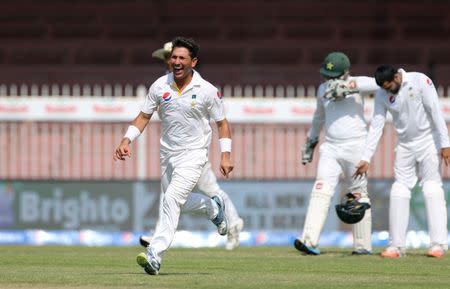 Pakistan's Yasir Shah celebrates the wicket of England's Stuart Broad. Action Images via Reuters / Jason O'Brien Livepic