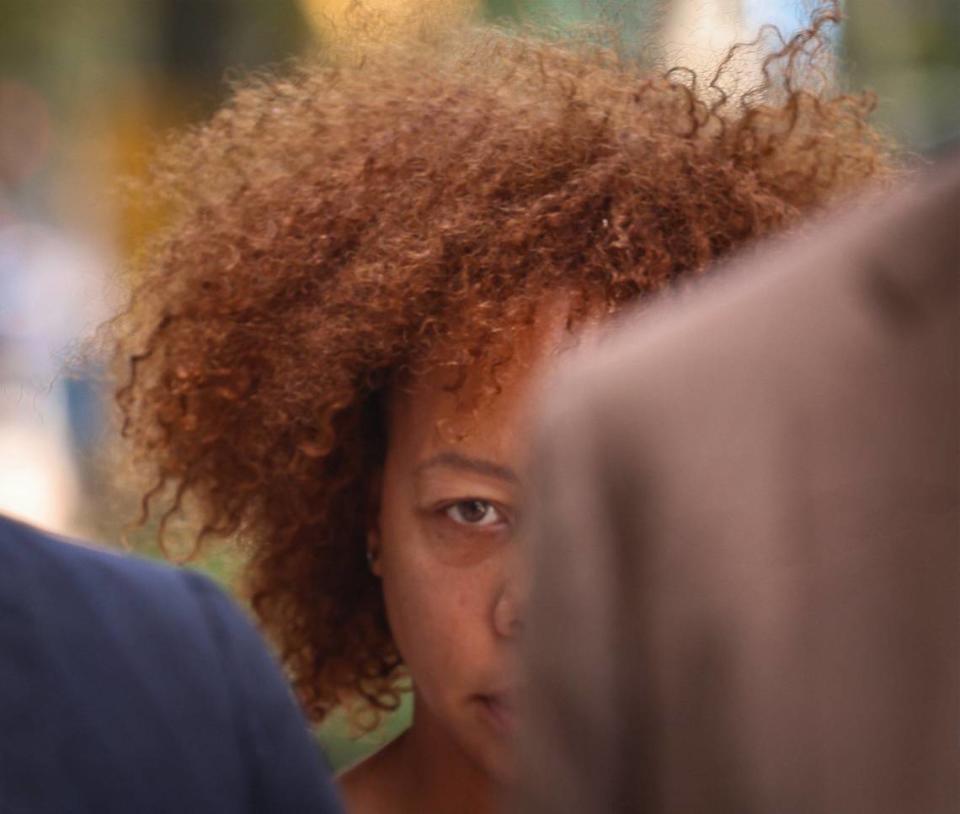 LaToya Ratlieff still suffers from the injury to her eye, she stands in the back as attorneys announced a lawsuit is filed by her and others against Fort Lauderdale Police Department for the violent response to peaceful protesters at the May 31, 2020, George Floyd protest on Monday, June 3, 2024, in Fort Lauderdale, Florida.