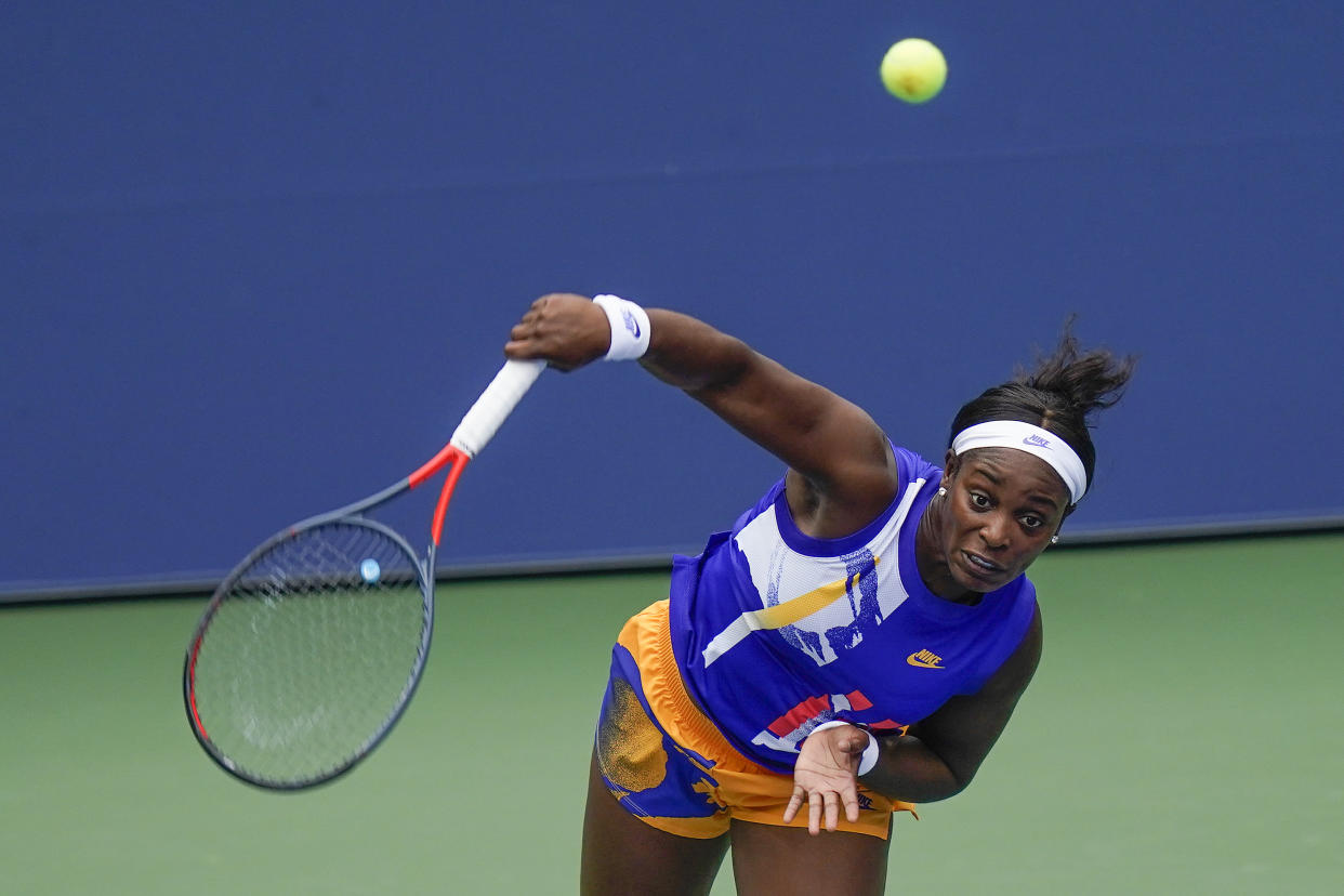 Sloane Stephens, of the United States, serves to Olga Govortsova, of Belarus, during the second round of the US Open tennis championships, Thursday, Sept. 3, 2020, in New York. (AP Photo/Seth Wenig)