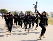 <p>Female members of a police commando unit march during a ceremony on International Women’s Day at the police headquarters in Islamabad, Pakistan, March 8, 2018. (Photo: Faisal Mahmood/Reuters) </p>