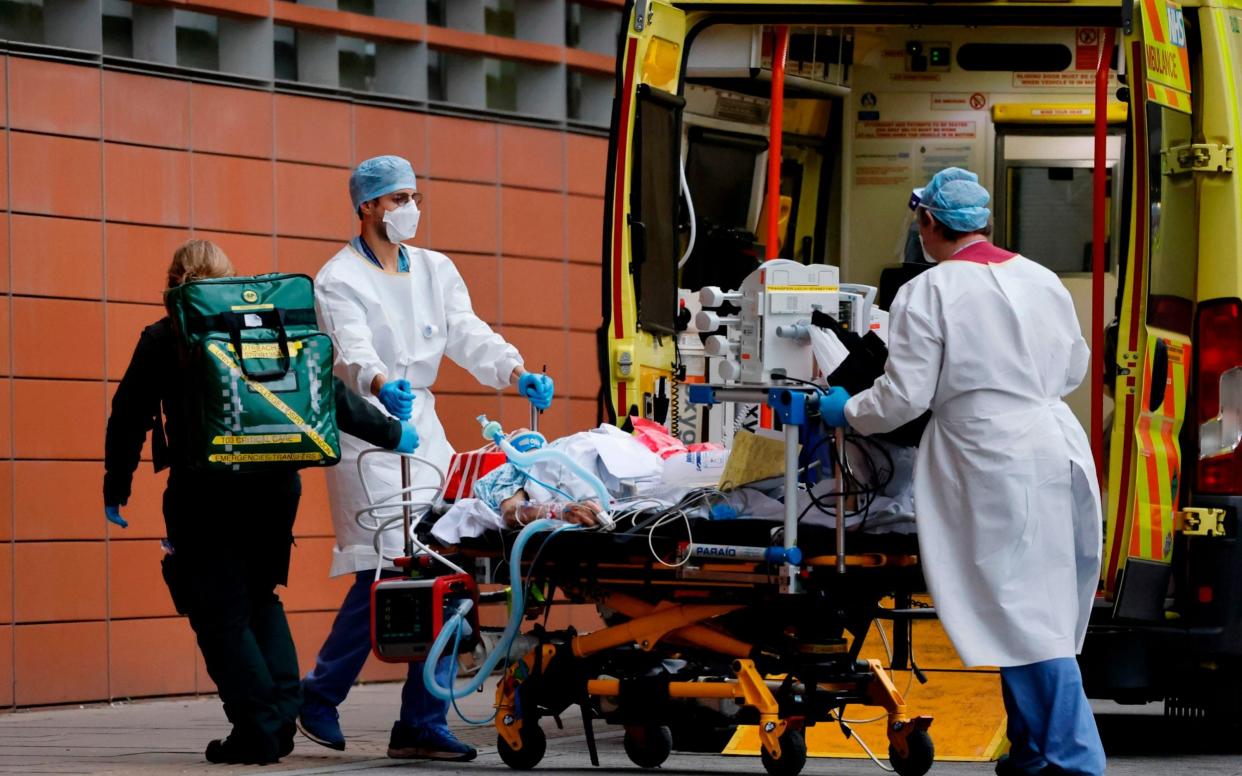 A patient being transferred to the Royal London Hospital - Tolga Akmen/AFP