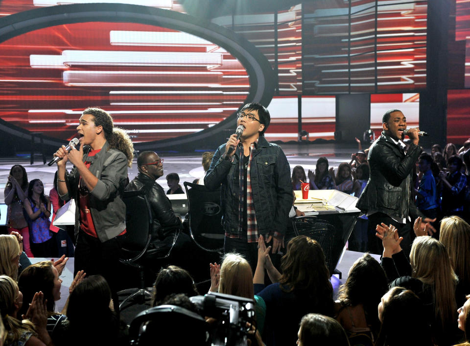 Contestants Joshua Ledet (R), DeAndre Brackensick and Heejun Han (C) perform onstage at FOX's 'American Idol' Season 11 Top 9 Live Performance Show on March 28, 2012 in Hollywood, California. (Photo by FOX via Getty Images)