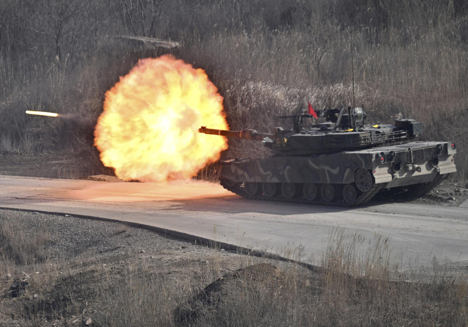 A South Korean K1A2 tank fires during a joint live fire exercise at a military training field in Pocheon Thursday, March 14, 2024, as part of the annual Freedom Shield joint military exercise between South Korea and the United States. (Jung Yeon-je /Pool Photo via AP)