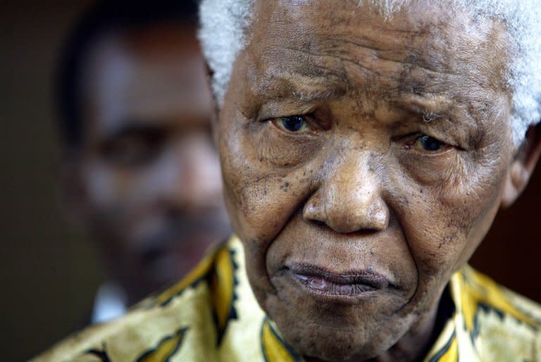 This file picture taken on December 7, 2005 shows former South African President and Nobel peace prize laureate Nelson Mandela speaking to the press at the Mandela Foundation. Mandela spent Christmas Eve in hospital Monday