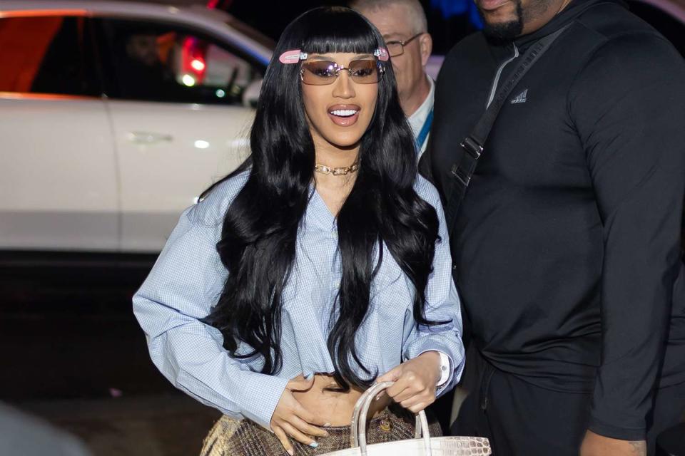 <p>Shutterstock / SplashNews</p> Cardi B has wardrobe malfunction and nearly misses courtside outing with Offset