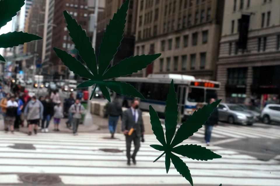 Cannabis stickers on a Weed World store window are pictured the day New York State legalized recreational marijuana use amid the coronavirus disease (COVID-19) pandemic in the Manhattan borough of New York City, New York, U.S., March 31, 2021. REUTERS/Carlo Allegri