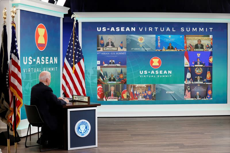 FILE PHOTO: U.S. President Biden participates virtually with the ASEAN summit from an auditorium at the White House in Washington