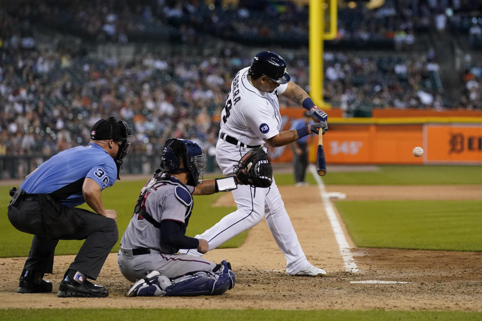 Detroit Tigers designated hitter Miguel Cabrera connects for a single during the eighth inning of a baseball game against the Minnesota Twins, Saturday, July 23, 2022, in Detroit. (AP Photo/Carlos Osorio)