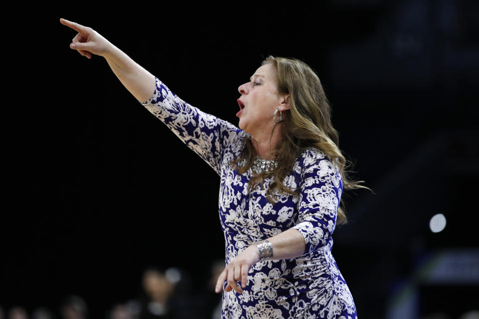 UCLA head coach Cori Close motions towards the court during the first half of an NCAA college basketball game against Stanford in the semifinal round of the Pac-12 women's tournament Saturday, March 7, 2020, in Las Vegas. (AP Photo/John Locher)