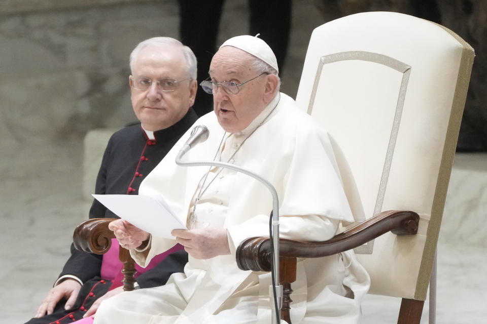 Pope Francis delivers his message as he meets with Vatican employees for the season greetings at the Vatican, Thursday, Dec. 21, 2023. (AP Photo/Gregorio Borgia)