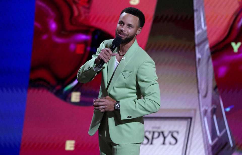 Host Stephen Curry, NBA player with the Golden State Warriors speaks at the ESPY Awards on Wednesday, July 20, 2022, at the Dolby Theatre in Los Angeles. (AP Photo/Mark Terrill)