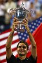 <p>Roger Federer of Switzerland celebrates after beating Novak Djokovic by 7-6(4), 7-6(2), 6-4 in 2007’s U.S. Open. </p>