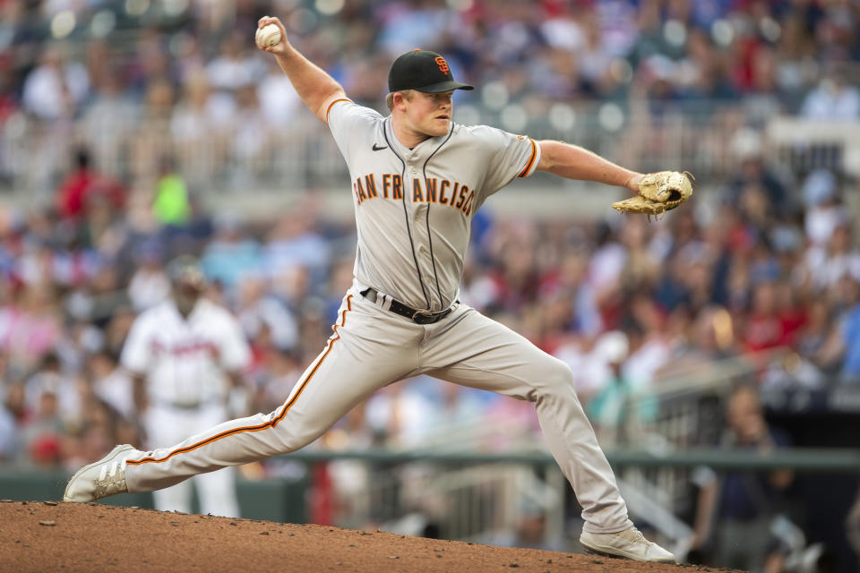 San Francisco Giants starting pitcher Logan Webb throws in the first inning of a baseball game against the Atlanta Braves, Monday, June 20, 2022, in Atlanta. (AP Photo/Hakim Wright Sr.)