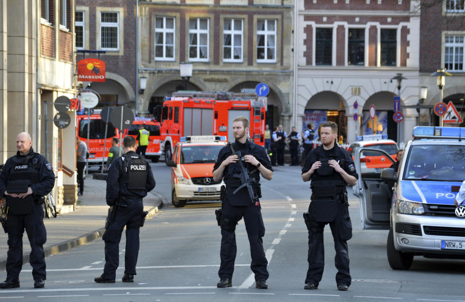 <p>Police officers secure the crime scene after a car crashed into a group of people leaving several dead in Muenster, Germany, Saturday, April 7, 2018. (Photo: Ferdinand Ostrop/AP) </p>