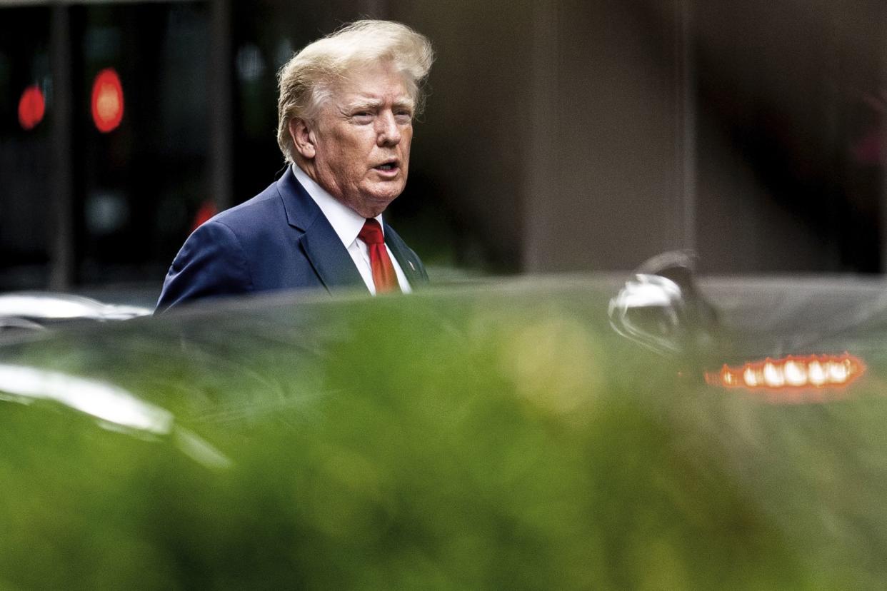 Former President Donald Trump departs Trump Tower, Wednesday, Aug. 10, 2022, in New York, on his way to the New York attorney general's office for a deposition in civil investigation. 