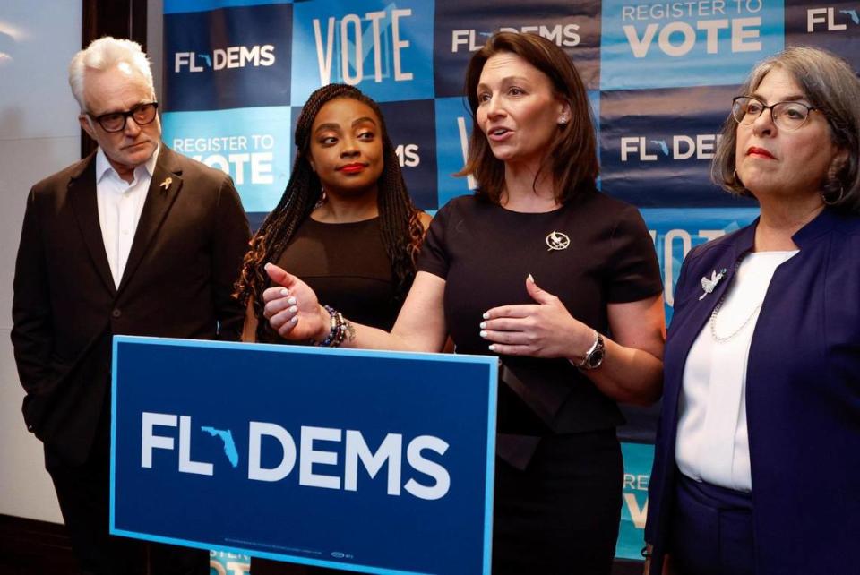 Florida Democratic Party Chair, Nikki Fried speaks to reporters at the Florida Democratic Party’s annual Leadership Blue Weekend at the Fontainebleau Hotel in Miami Beach, Florida, on Saturday, July 8, 2023. Joining her at the podium are, from left, actor and producer Bradley Whitford, Florida State Representative Dotie Joseph and Miami-Dade Mayor Daniella Levine Cava.