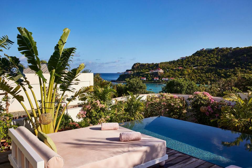 A plunge pool and lounge bed at Le Tropical Ho&#x000302;tel St Barth