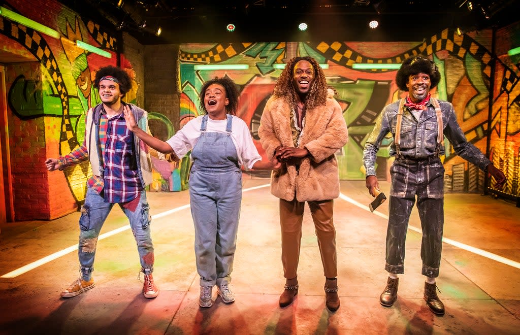Tarik Fimpong (Scarecrow), Cherelle Williams (Dorothy), Jonathan Andre (Lion), Llewellyn Graham (Tinman) in ‘The Wiz' at Hope Mill Theatre (Pamela Raith)