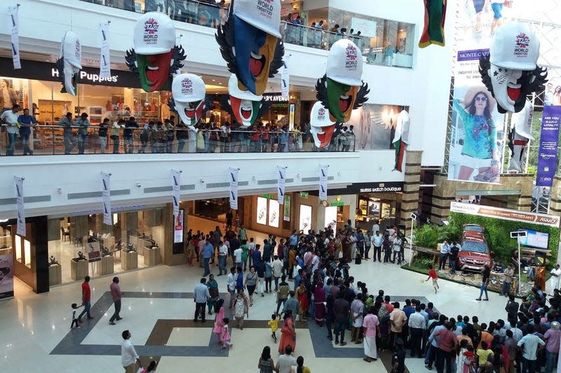 A shopping mall in India. Urban Indian consumers can’t feel the gravity of environmental threats since they have continued access to amenities such as clean water or electricity, writes the author of this commentary.