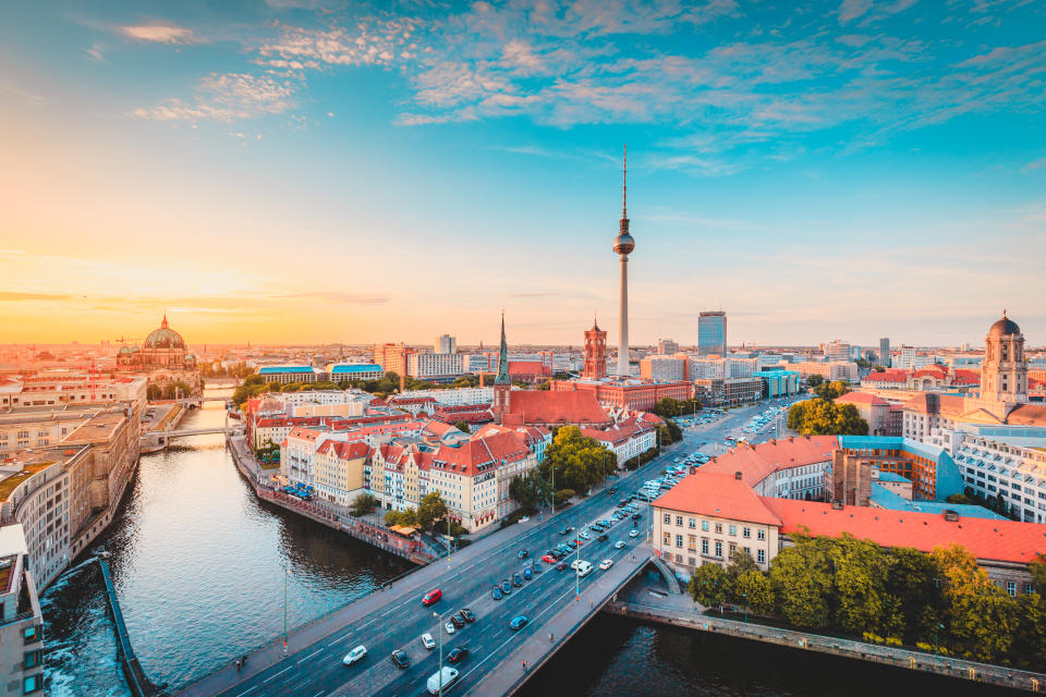 Classic view of Berlin skyline with famous TV tower and Spree in beautiful golden evening light at sunset, central Berlin Mitte, Germany