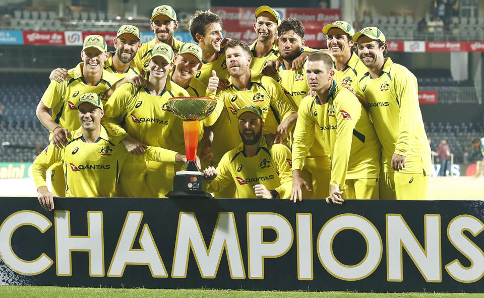 Aussie players, pictured here with the trophy after their ODI series win over India.