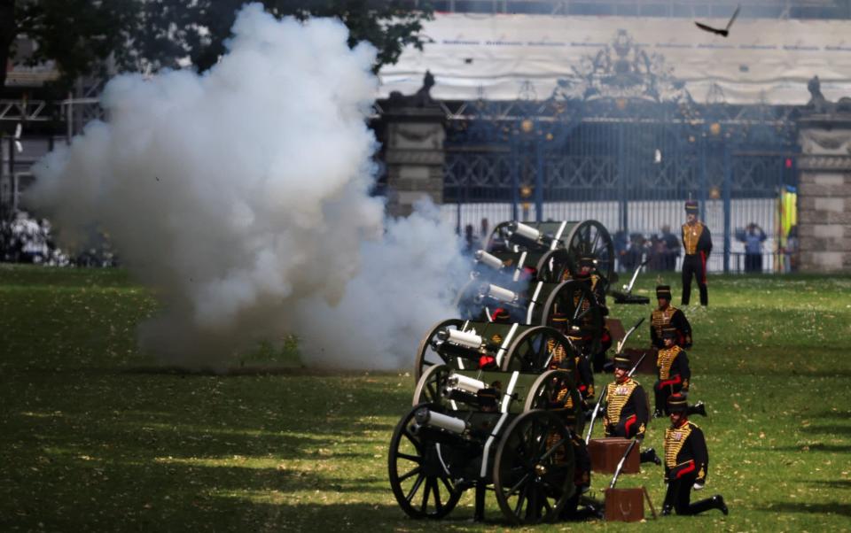 A gun salute is fired